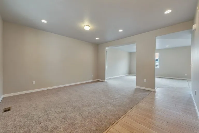 Open gathering area in a new home from McArthur Homes.