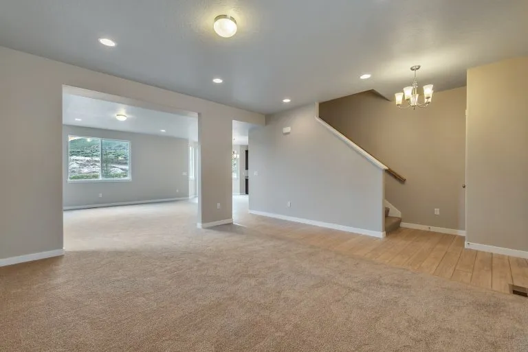 Gathering area and stairs in a new home from McArthur Homes.