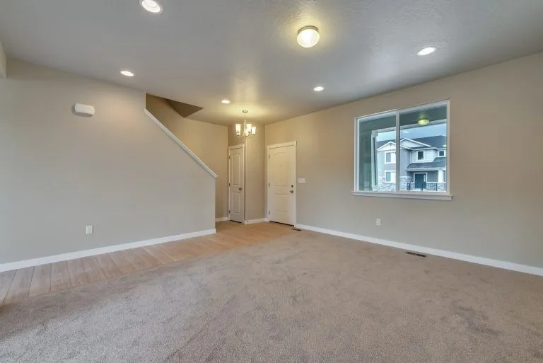 Front door and gathering area in a new home from McArthur Homes.