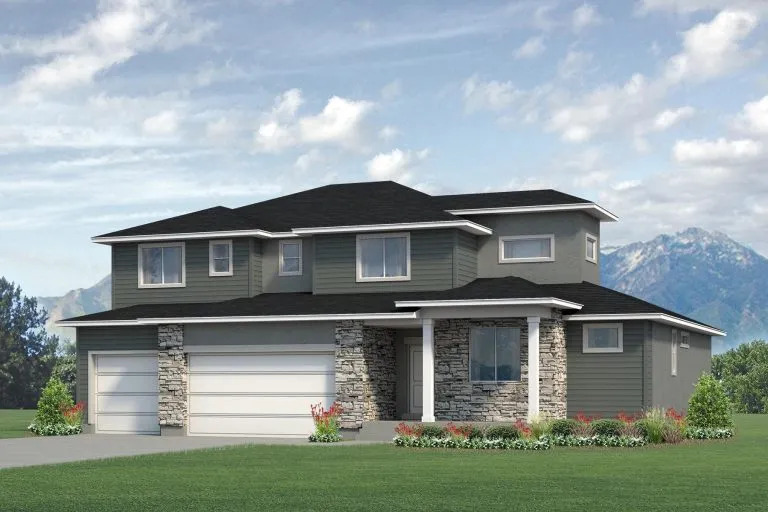 A modern two-story house with gray siding, stone accents, large white garage doors, and a manicured lawn. Mountains and a partly cloudy sky are visible in the background.